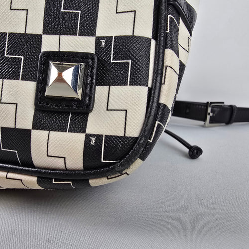 L.A.M.B. Black White Geometric Drawstring Shoulder Bag