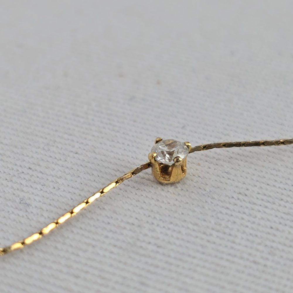 TAI Gold Tone Delicate Crystal Pendant Necklace