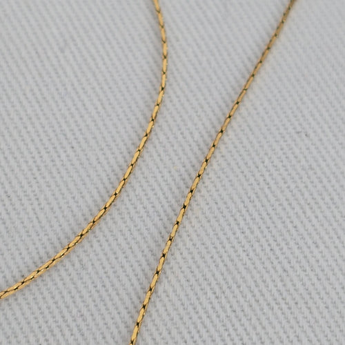TAI Gold Tone Delicate Crystal Pendant Necklace