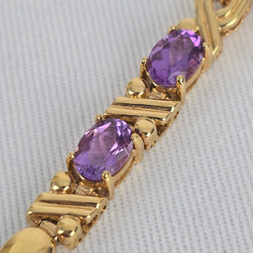 Jules Jürgensen Ladies Gold Tone Watch with Purple Gemstone Bracelet
