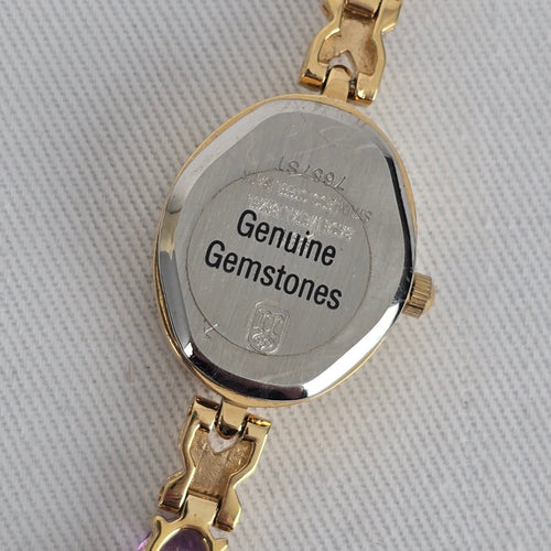 Jules Jürgensen Ladies Gold Tone Watch with Purple Gemstone Bracelet