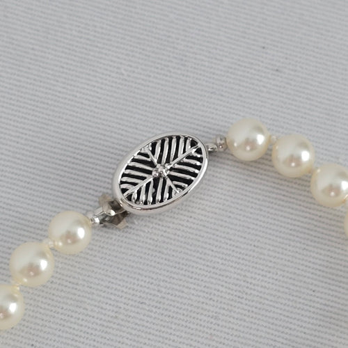 Vintage Long Faux Pearl Beaded Necklace with Decorative Silver Tone Clasp