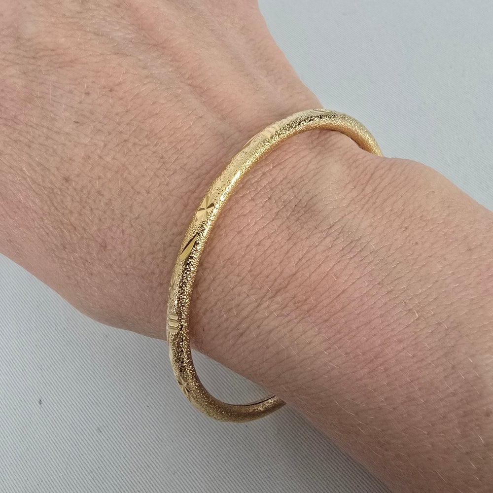 Gold Tone Textured Etched Hinged Bangle Bracelet