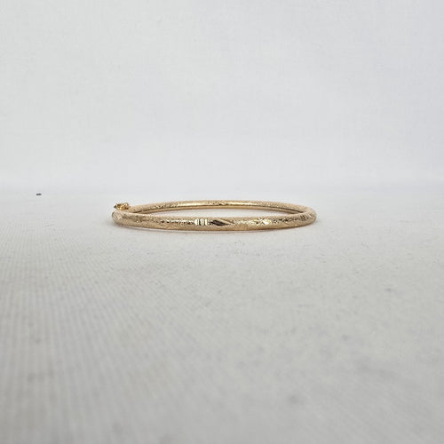 Gold Tone Textured Etched Hinged Bangle Bracelet