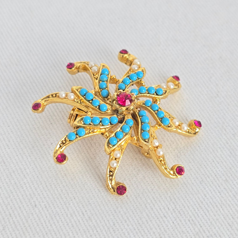 Vintage Coro Turquoise & Ruby Rhinestone Pinwheel Brooch