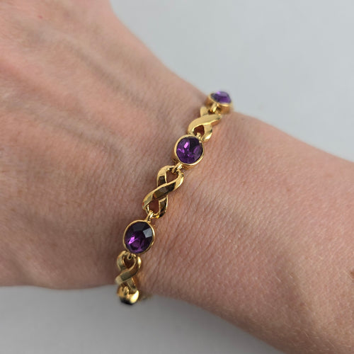 Vintage Avon Gold-Tone Purple Crystal Infinity Link Bracelet