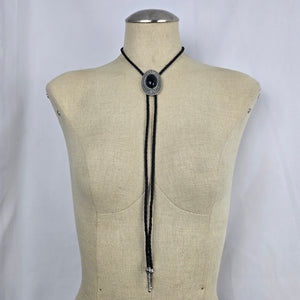 Black Oval Stone Western Bolo Tie – Antique Silver-Tone Concho