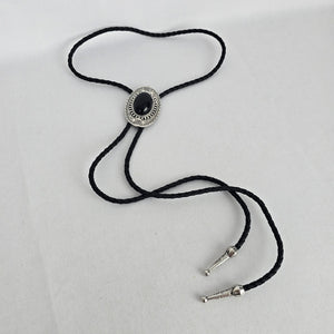 Black Oval Stone Western Bolo Tie – Antique Silver-Tone Concho
