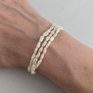 Vintage Triple Strand White Baroque Pearl Bracelet – Gold-Tone Floral Clasp