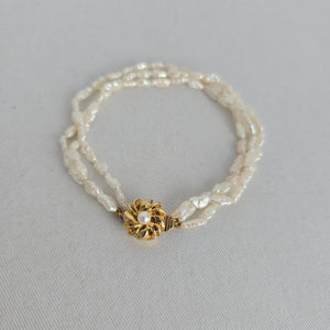 Vintage Triple Strand White Baroque Pearl Bracelet – Gold-Tone Floral Clasp