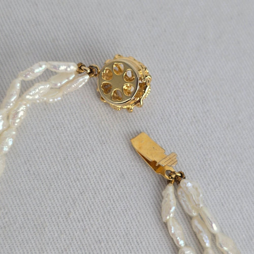 Vintage Triple Strand White Baroque Pearl Bracelet – Gold-Tone Floral Clasp