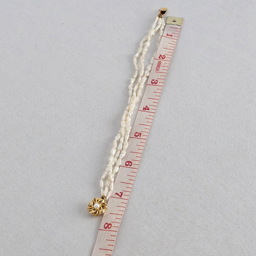 Vintage Triple Strand White Baroque Pearl Bracelet – Gold-Tone Floral Clasp