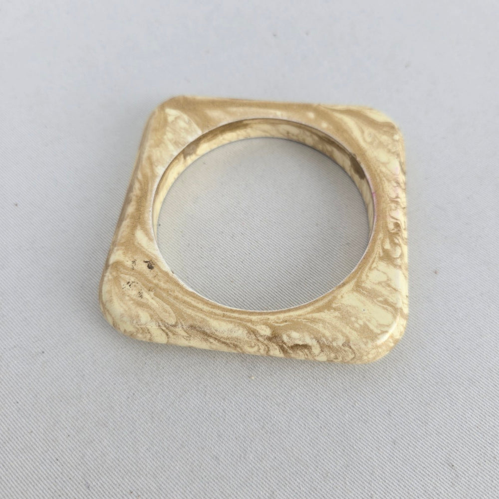 Cream Marbled Square Bangle Bracelet with Gold-Tone Swirl Detail