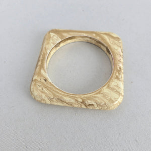Cream Marbled Square Bangle Bracelet with Gold-Tone Swirl Detail