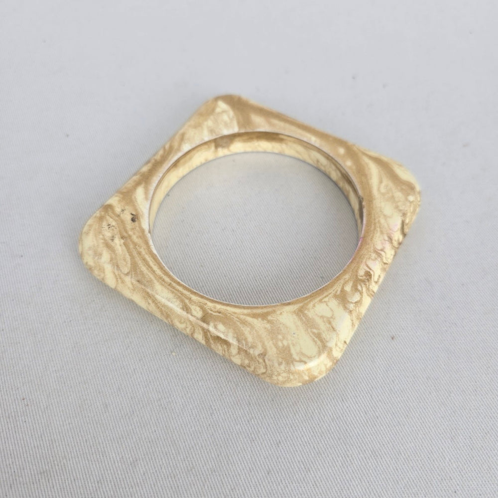 Cream Marbled Square Bangle Bracelet with Gold-Tone Swirl Detail