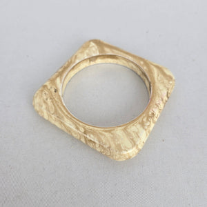 Cream Marbled Square Bangle Bracelet with Gold-Tone Swirl Detail