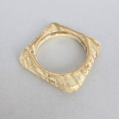 Cream Marbled Square Bangle Bracelet with Gold-Tone Swirl Detail