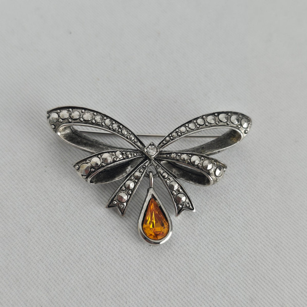 Vintage Avon Silver-Tone Bow Brooch with Amber Teardrop Rhinestone