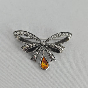 Vintage Avon Silver-Tone Bow Brooch with Amber Teardrop Rhinestone