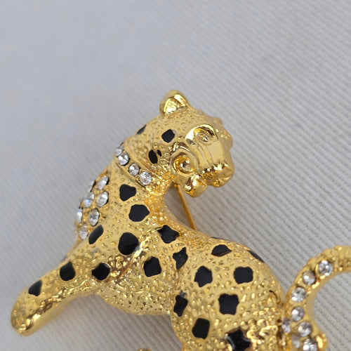 Vintage Gold Tone Rhinestone Leopard Brooch with Black Enamel Spots