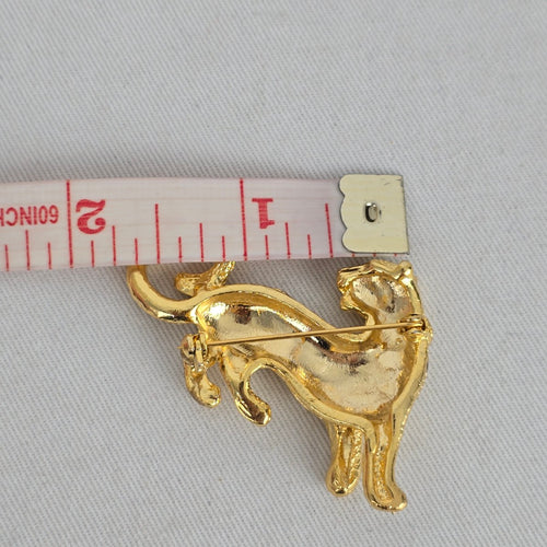 Vintage Gold Tone Rhinestone Leopard Brooch with Black Enamel Spots