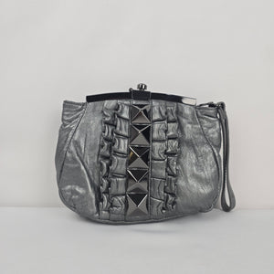 Betsey Johnson Metallic Gray Genuine Leather Studded Ruffle Wristlet Clutch