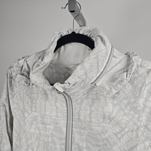 Lululemon Run Travel To Track Jacket Beachy Floral White Fossil – Size 6