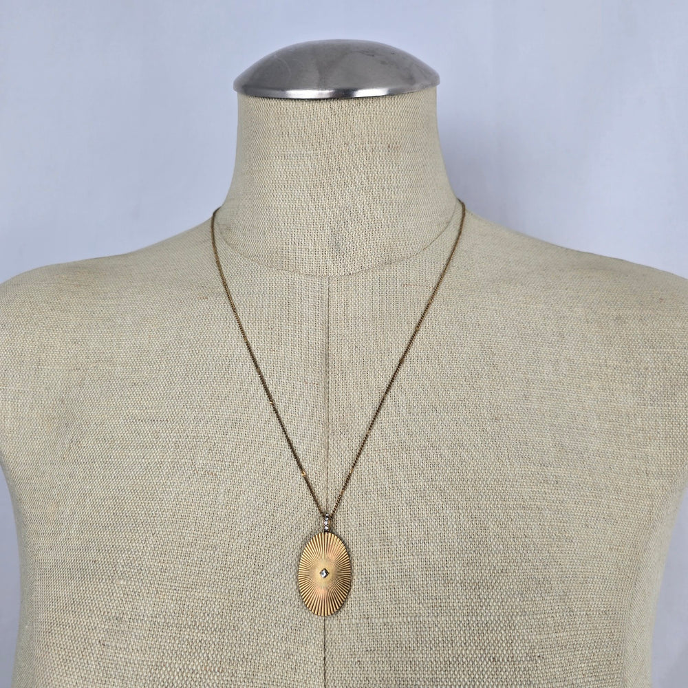 Stella & Dot Starstruck Charm Gold Tone Oval Sunburst Rhinestone Pendant Necklace