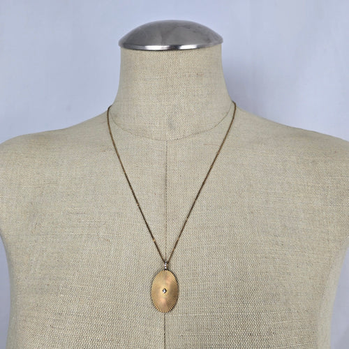 Stella & Dot Starstruck Charm Gold Tone Oval Sunburst Rhinestone Pendant Necklace