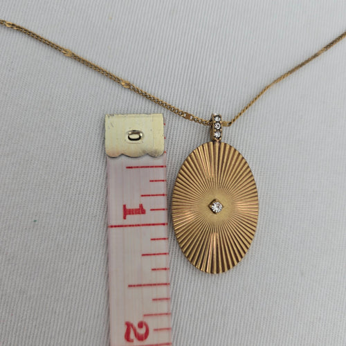 Stella & Dot Starstruck Charm Gold Tone Oval Sunburst Rhinestone Pendant Necklace