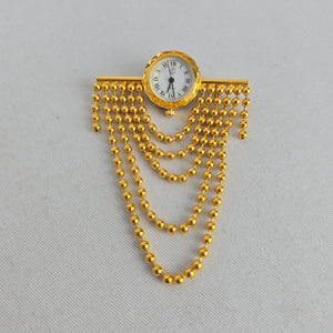 Vintage Gold Tone Quartz Brooch Watch with Cascading Bead Chain Swags