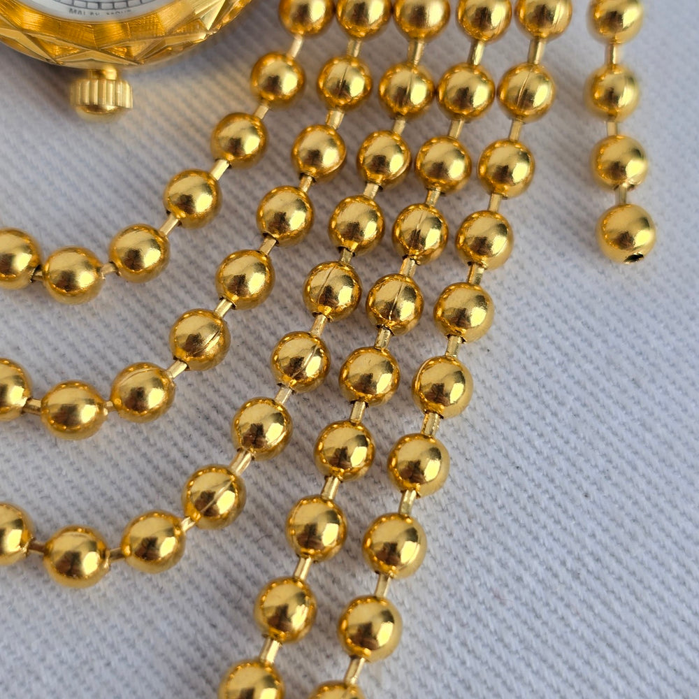Vintage Gold Tone Quartz Brooch Watch with Cascading Bead Chain Swags