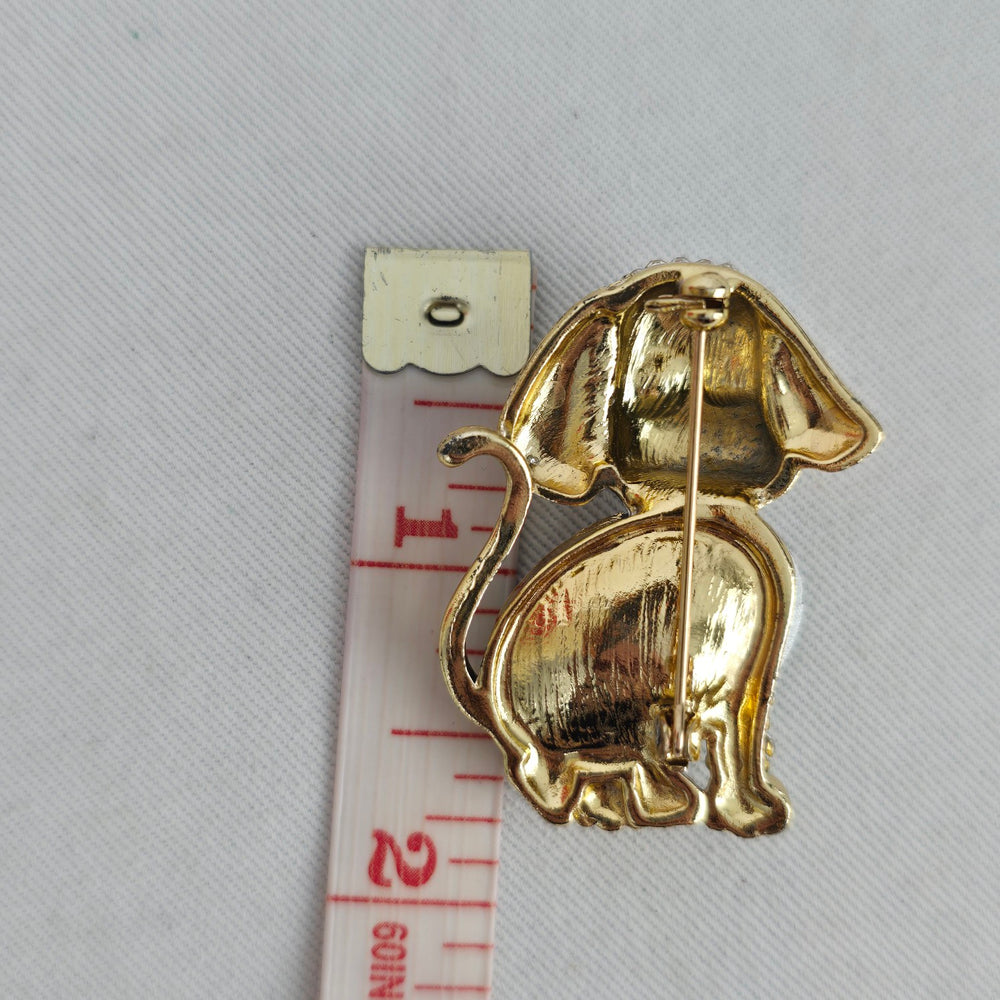 Vintage Gold Tone Rhinestone Dog Brooch with Large Purple Stone