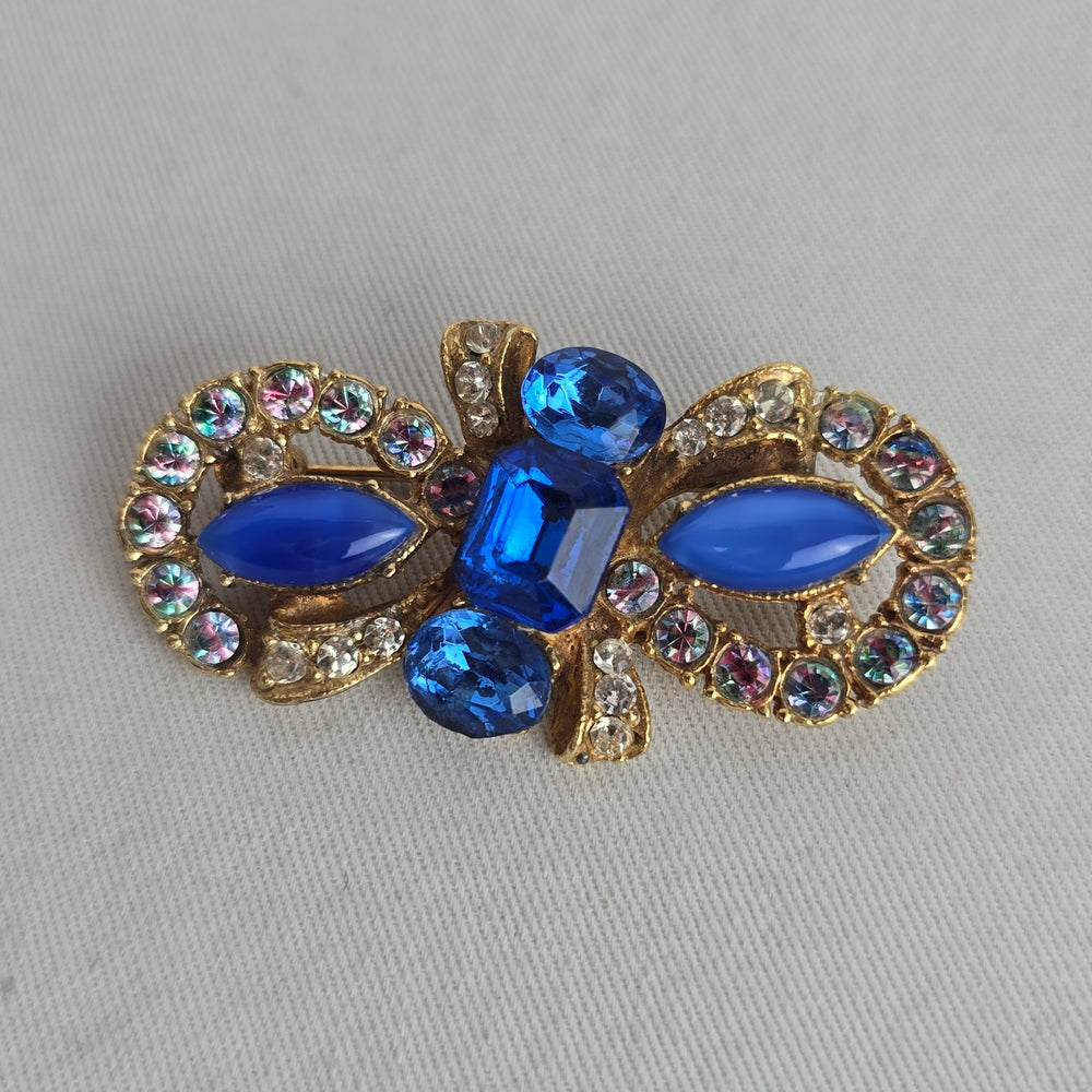 Vintage Czech Unsigned Sapphire Blue Glass Marquise Cabochon Bow Brooch Gold Tone Pin