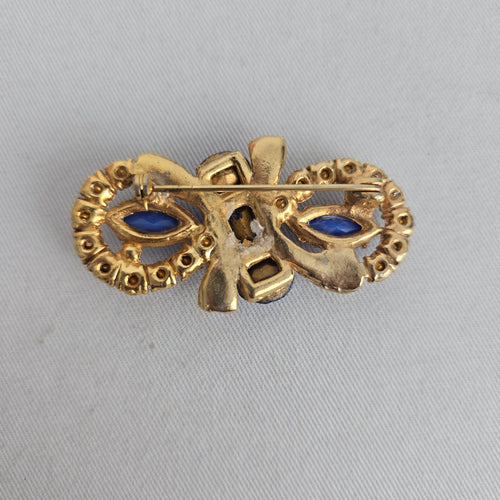 Vintage Czech Unsigned Sapphire Blue Glass Marquise Cabochon Bow Brooch Gold Tone Pin