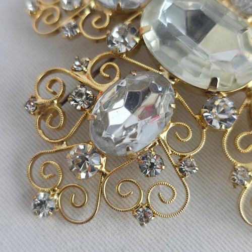 Vintage Oversize Gold Tone Filigree Cross Brooch with Clear Stones