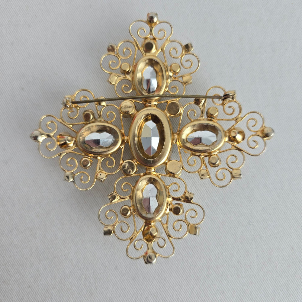 Vintage Oversize Gold Tone Filigree Cross Brooch with Clear Stones
