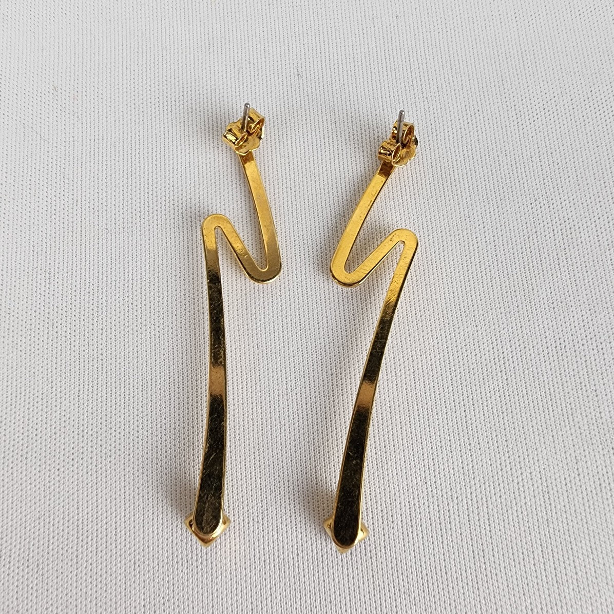 Gold Tone Swoosh Crystal Stud Earrings